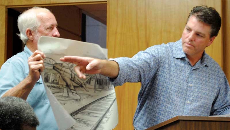 DAILY LEADER / JUSTIN VICORY / Chad Smith (from right) requests approval from the board of aldermen Tuesday night to relocate an F-86 Sabre jet from Hazlehurst to Brookhaven, while Randall Smith holds a rendering of the jet as it would look relocated to downtown Brookhaven.  