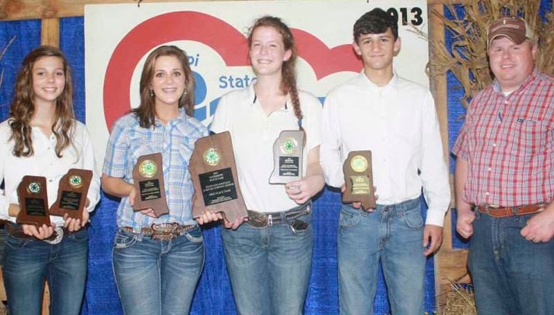 PHOTO SUBMITTED / First place 4-H Livestock Judging Team members include (from left) Rachel McDaniel (also third high individual), Sara Terrell, Mackenzie Ritchie, Brant White and Brandon Alberson, Extension agent/coach.