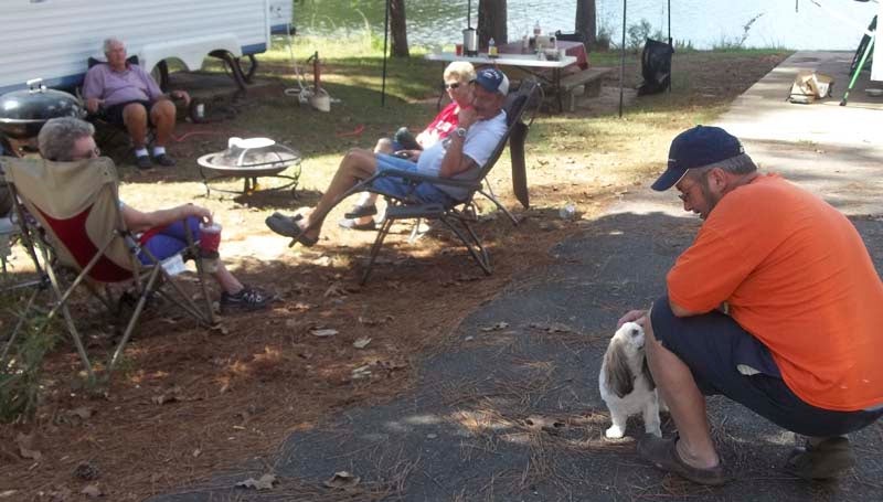 DAILY LEADER / KIM HENDERSON / Daisy, a Shih-Tzu, her owners and their friends, all of Byram, enjoy the fall weather at their campsite at Lake Lincoln recently.