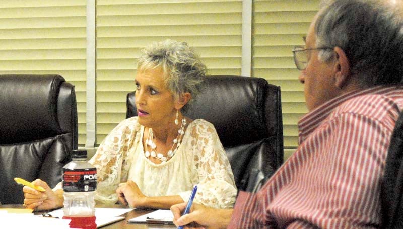 DAILY LEADER / JUSTIN VICORY / Assistant Superintendent Letha Presley, filling in for Superintendent Terry Brister, considers agenda items at Monday night's Lincoln County School Board meeting. 