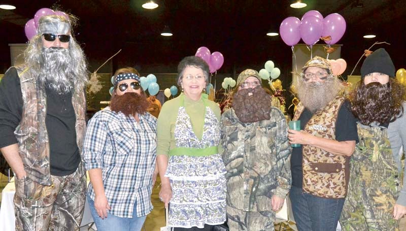 In addition to the silent and live auctions Monday night at the BARL fund raiser , local business persons, professionals and officials dressed up for the evening as "celebrities" to help with the dinner service and to earn tips for BARL. Among the "celebrity" wait persons were characters from the TV show, "Duck Dynasty," portrayed by (from left) Mayor Joe Cox, Samantha Melancon, Patsy Walker, Brenda Smith, Cindy Smith and Holly Slay. 