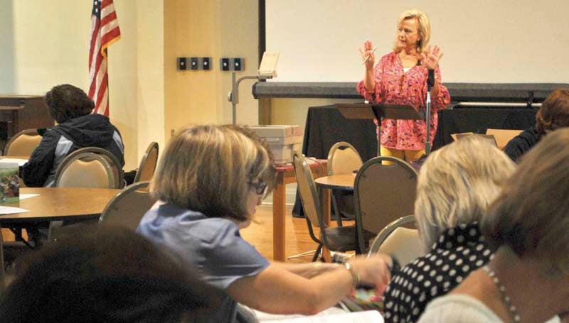DAILY LEADER / KIM HENDERSON / Brookhaven's Theresa Sones speaks to a crowd of more than 100 women at a recent Bible study at First Baptist Church. Popular with both old and young attendees, the teacher has been leading the Thursday morning group for nearly 25 years. 