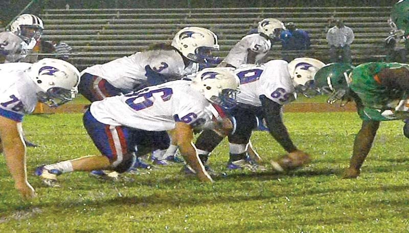 DAILY LEADER / TAMMY CARRAWAY / Wesson quarterback Tyler Christmas (3) calls out the play to his linemen, Chase Twiner (76), Justin Boone (66) and Josh Francois (69), against Wilkinson County Friday night.