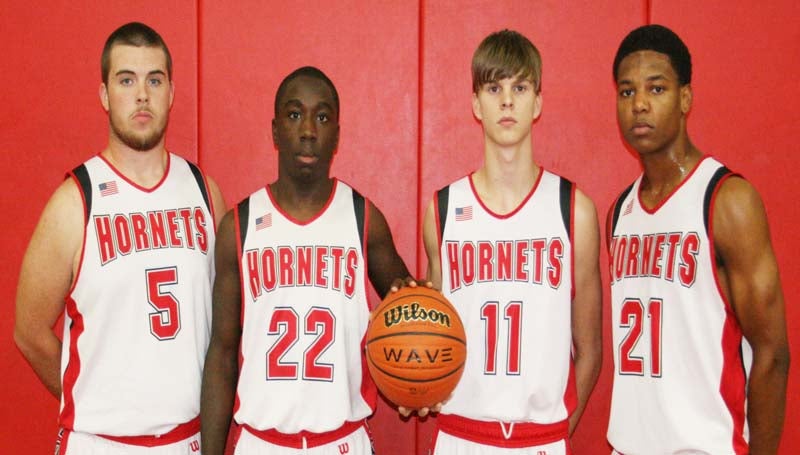 DAILY LEADER / MARTY ALBRIGHT / Representing the Loyd Star Hornets in the 2013-14-basketball season are seniors (from left) Nathaniel Shankle-Bland, La'Treall Smith, Heath Haas and Ethan Newman.