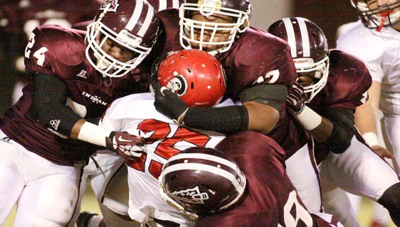 DAILY LEADER / JONATHON ALFORD / The Hazlehurst Indians show off their defensive brute strength in the opening round of the Class 3A playoffs against the West Marion Trojans Friday night at Robert McDaniel Sr. Stadium.