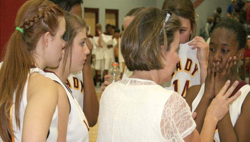 DAILY LEADER / MARTY ALBRIGHT / Enterprise coach Jill Nations speaks to her Lady Jackets during a timeout in the closing seconds of the fourth quarter against Loyd Star Friday night in the Lincoln County Tournament.