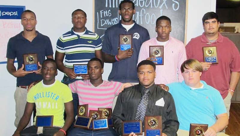 DAILY LEADER / SUBMITTED / The Franklin County football team was honored during a fall banquet. Players receiving awards were (seated, from left) Demarius Tyler, Team Captain; Chris Robinson, MVP Offense Player, MVP Offensive Back, Team Captain;  Darrin Wiley, MVP Defensive Player, Team Captain; Connor Quin, Bulldog Award; (standing, from left) Jerry Hannon, MVP Defensive Lineman; Troy Norman, Team Captain; Chris Boss, Sportsmanship Award; Chris O'Quinn, MVP Defensive Back and Allen Virgin, MVP Offensive Lineman. Not pictured is Bernard Selman, Most Improved. The Bulldogs were under the direction of head coach Chris Calcote.