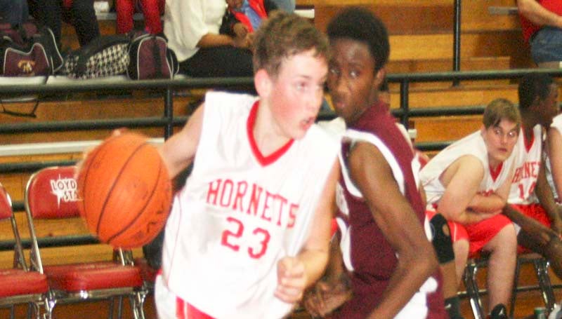 DAILY LEADER / MARTY ALBRIGHT / Loyd Star's Dane Gregory Smith (23) was the offensive leader for the Hornets Thursday against Enterprise.