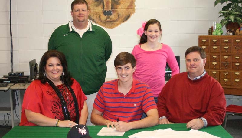 DAILY LEADER / MARTY ALBRIGHT /  West Lincoln pitcher Brady Wilson has signed a baseball scholarship with the Southwest Community College Bears. Present for the ceremony were his parents, (seated) Anita and Jason Wilson, and (standing, from left) West Lincoln coach Steve Barrington and Brady's sister, Bailey Wilson.
