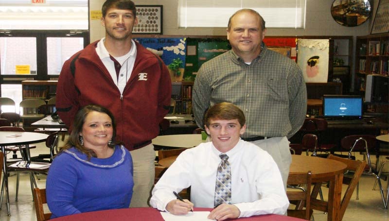 DAILY LEADER / MARTY ALBRIGHT / Enterprise pitcher/infielder Jackson Cole has signed a baseball scholarship with the Copiah-Lincoln Community College Wolfpack. Present for the ceremony was his mother (seated), Frances Cole; and (standing, from left) Enterprise coach Cass Brister and Jackson's father Tom Cole.