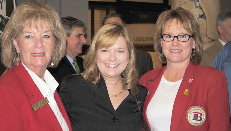 Brookhaven-Lincoln County Chamber of Commerce ambassadors Imogene Ryan (left) and Sheila Burd (right) are seen with state Rep. Becky Currie, R-Brookhaven, at Brookhaven Day at the Capitol Tuesday.