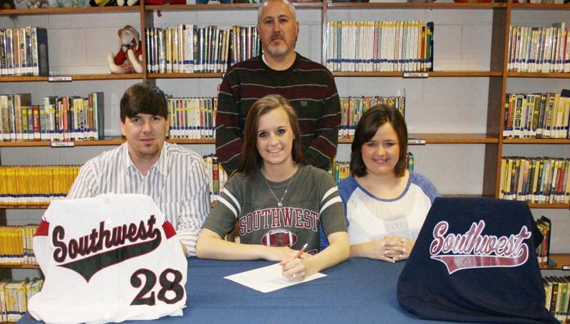 DAILY LEADER / MARTY ALBRIGHT /  Bogue Chitto first baseman has signed a softball scholarship with the Southwest Community College Lady Bears. Present for the ceremony were her parents John and Michelle Givens (seated). Standing is Bogue Chitto softball coach Scott Leggett.