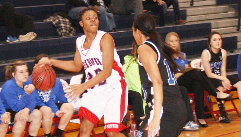 DAILY LEADER / MARTY ALBRIGHT / Brookhaven's Diamond Herring (32) waits for her teammates to set up while Pearl River Central's Brandi Lee (15) applies pressure Friday night