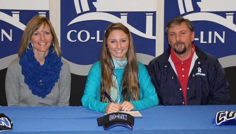 CO-LIN MEDIA / NATALIE DAVIS / North Pike softball standout McKenzie Brock of Summit (seated center) signs to play with the Co-Lin Lady Wolves. Present for the signing were her parents, Leslee and Darryl Brock.