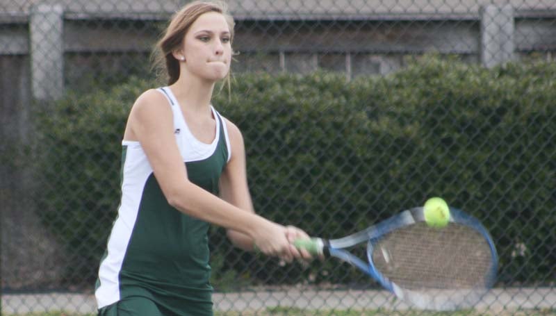 DAILY LEADER / MARTY ALBRIGHT / West Lincoln's Madison Franklin reflects a serve against Franklin County in tennis action Wednesday at Brookhaven Country Club.