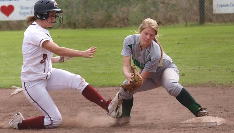DAILY LEADER / TRACY FISCHER / Lawrence County's Lexie Johnson (3) hustles back to first base safely before Vicksburg's Faith Thomas (3) could make the tag Saturday.
