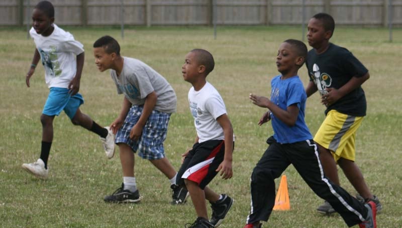 DAILY LEADER / MARTY ALBRIGHT / Several kids came out Saturday and registered for the Brookhaven Southern Wildcat pee-wee league. The kids participated in many different drills on opening day. These kids are practicing line drills.