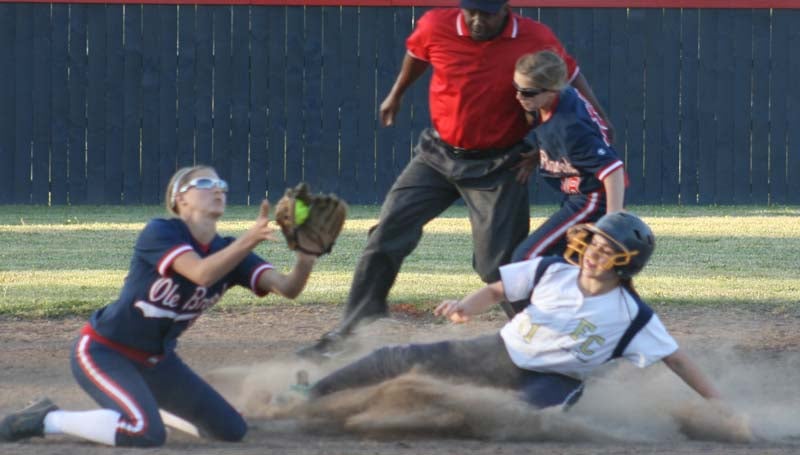 DAILY LEADER / MARTY ALBRIGHT / Franklin County's runner Harley McKay (right) slides into second base safely as Brookhaven shortstop Katie Grace Culpepper receives the throw Thursday in softball action.
