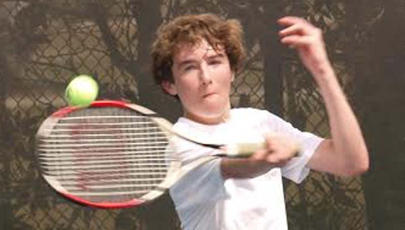 DAILY LEADER / TRACY FISCHER /  Enterprise's Noah McKone returns a serve in mixed doubles action.