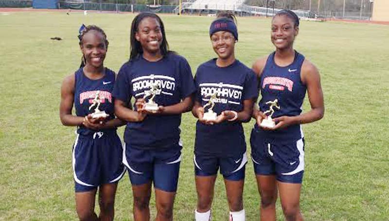 DAILY LEADER / PHOTO SUBMITTED / Brookhaven Lady Panthers finishe in first place in the girls 4 x 100 relay event. The members are (from left) Nikeshia Finley, Jerricka Williams, Artia Robinson and Johnaya Williams.
