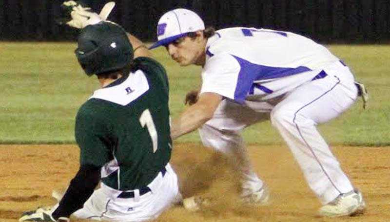 DAILY LEADER / SHERYLYN EVANS / Brookhaven Academy's shortstop Alex Smith tags out Central Hinds runner Alex Biggs (1) on a steal attempt Thursday at Harold-Williams baseball park.