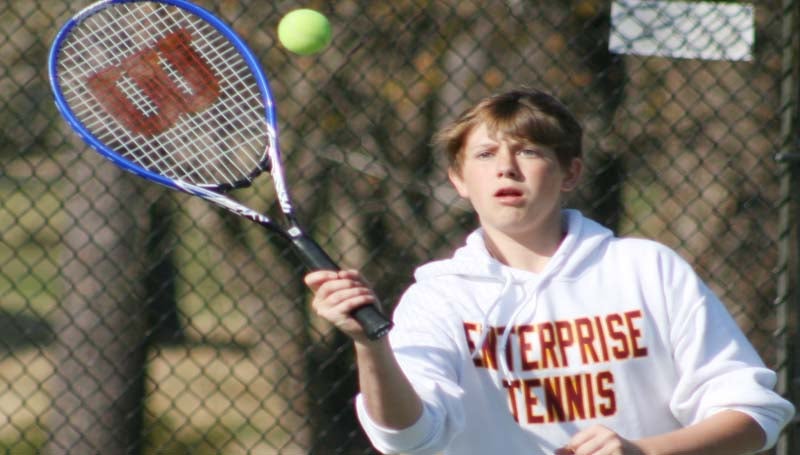 DAILY LEADER / MARTY ALBRIGHT / Enterprise's Wyatt Coleman helps his team win the Boys No. 2 Doubles match against Franklin County Thursday.