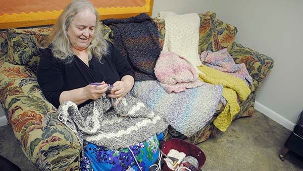 DAILY LEADER / RHONDA DUNAWAY /Emily Rossie crochets a prayer shawl at the Episcopal Church of the Redeemer Wednesday. Rossie made her first prayer shawl for a sick relative in 2005 and has helped start a shawl ministry with the Redeemer Episcopal Church Women.