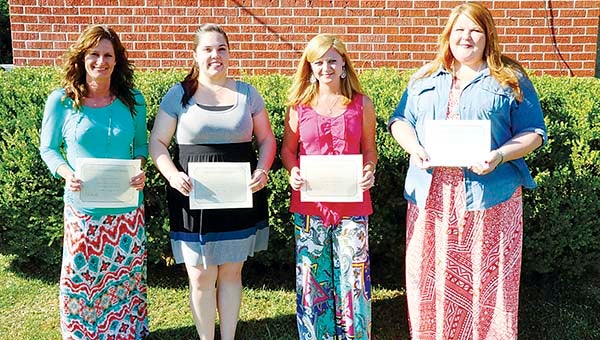 PHOTO SUBMITTED / Lincoln County School District recognized Teachers of the Year at the Monday school board meeting. Belinda Spears (from left) of West Lincoln Attendance Center, Kristy Cline of Enterprise Attendance Center, Julie Akins of Bogue Chitto Attendance Center and Katie Furr of Loyd Star Attendance Center were all honored. Furr was recognized as District Teacher of the Year.