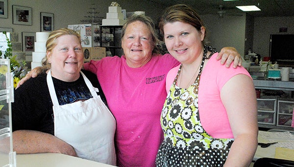 DAILY LEADER / RHONDA DUNAWAY / Sue Forsyth, (from left) Debby Bardwell and Natalie Forsyth talk about Mother’s Day.