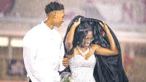 Brookhaven High School crowned its homecoming queen, Kyla Wilcher, Friday night. Wilcher braved the rain with escort Marte’ Jones.