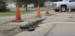 Photo by Alex Jacks / The crumbling brick storm drain under S. Church Street has caused damage to the road in front of Brookhaven Elementary School.