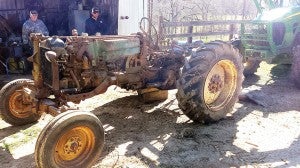 Photo submitted/The 1956 tractor had seen decades of service before it was stored in a barn on the Smith’s farm.  